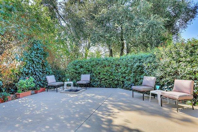 2985 Meyerloa Lane Pasadena, CA 91107 - Photo 27 of 30 a view of a chairs and table in the backyard