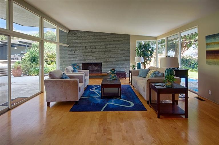 2985 Meyerloa Lane Pasadena, CA 91107 - Photo 6 of 30 a living room with furniture wooden floor and a fireplace