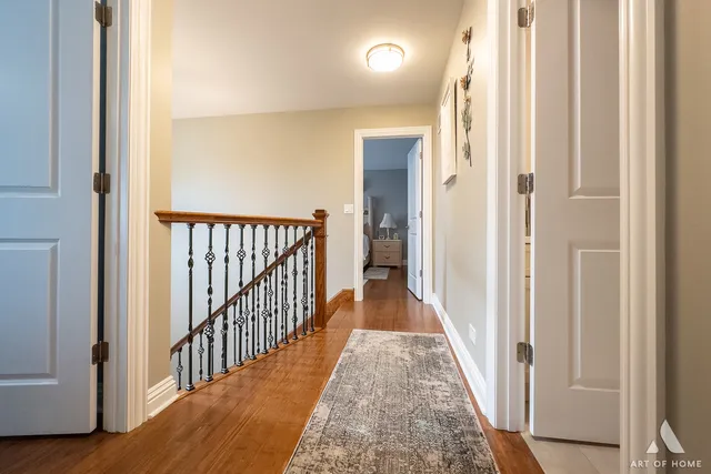 a bedroom with a bed window and a flat screen tv