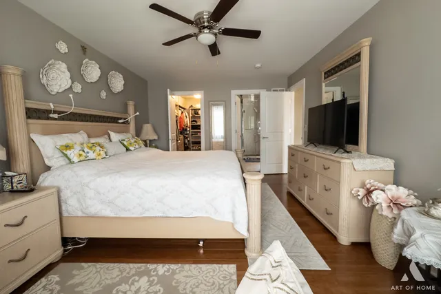 a bathroom with a granite countertop sink a mirror and a shower