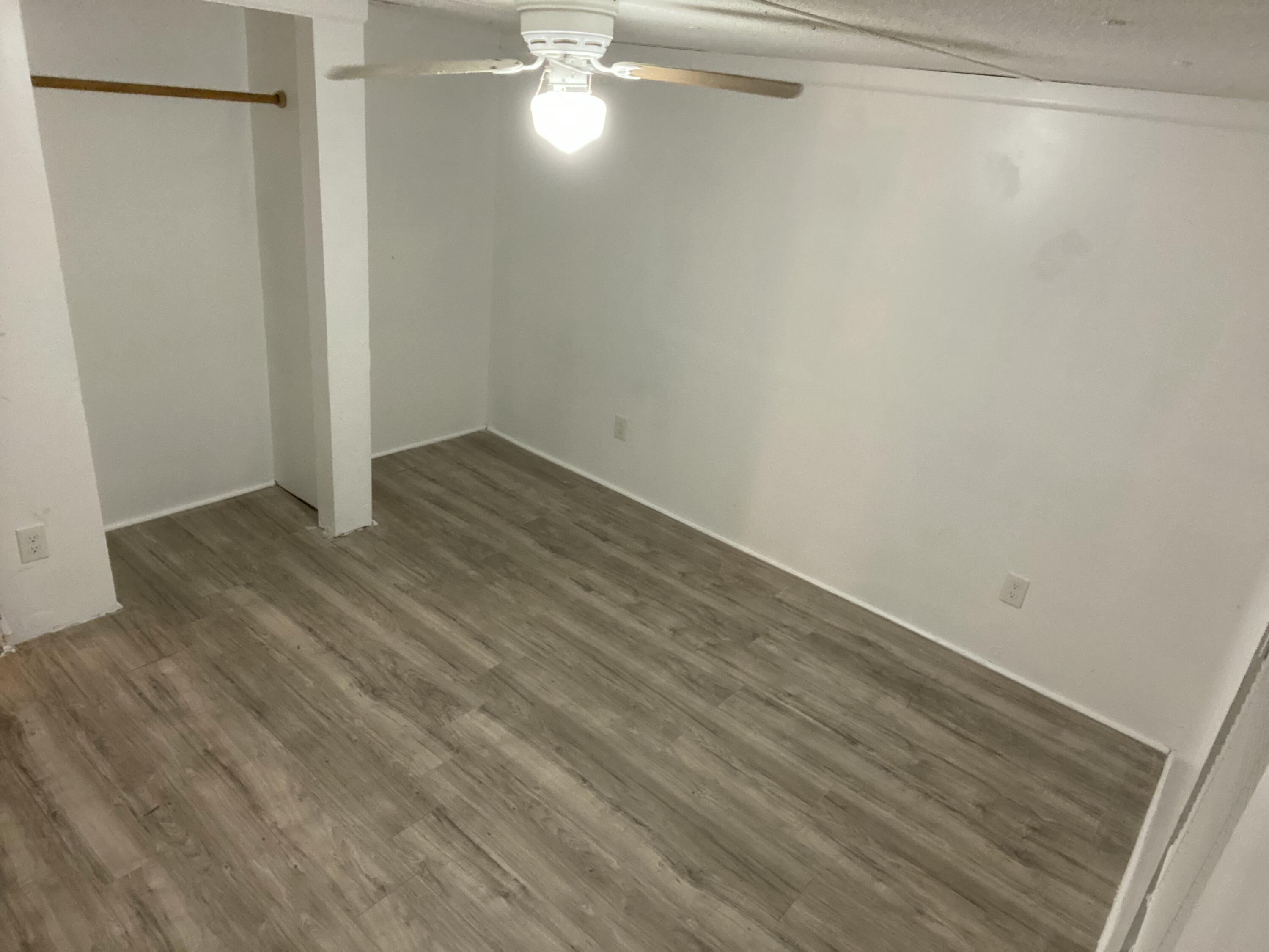 7835 Southeast 60th Drive Okeechobee, FL 34974 - Photo 21 of 35 a view of a room with wooden floor