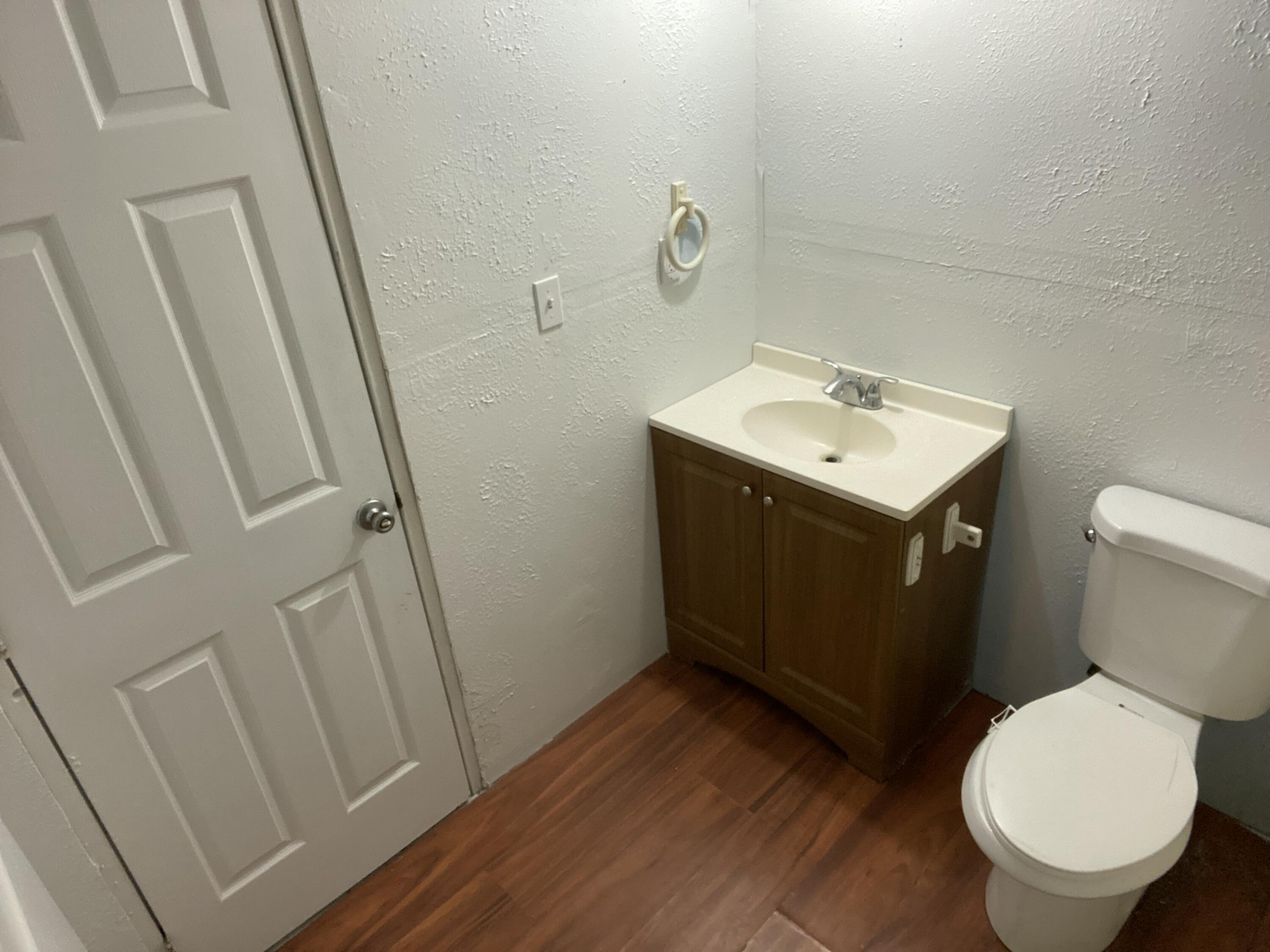 7835 Southeast 60th Drive Okeechobee, FL 34974 - Photo 27 of 35 a bathroom with a sink and toilet