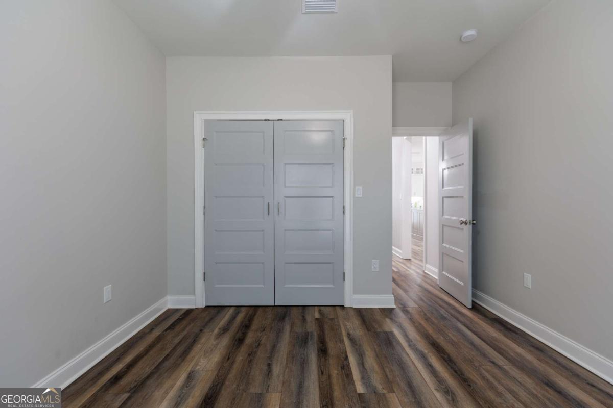601 Pine Point Circle Valdosta, GA 31602 - Photo 29 of 45 an empty room with closet