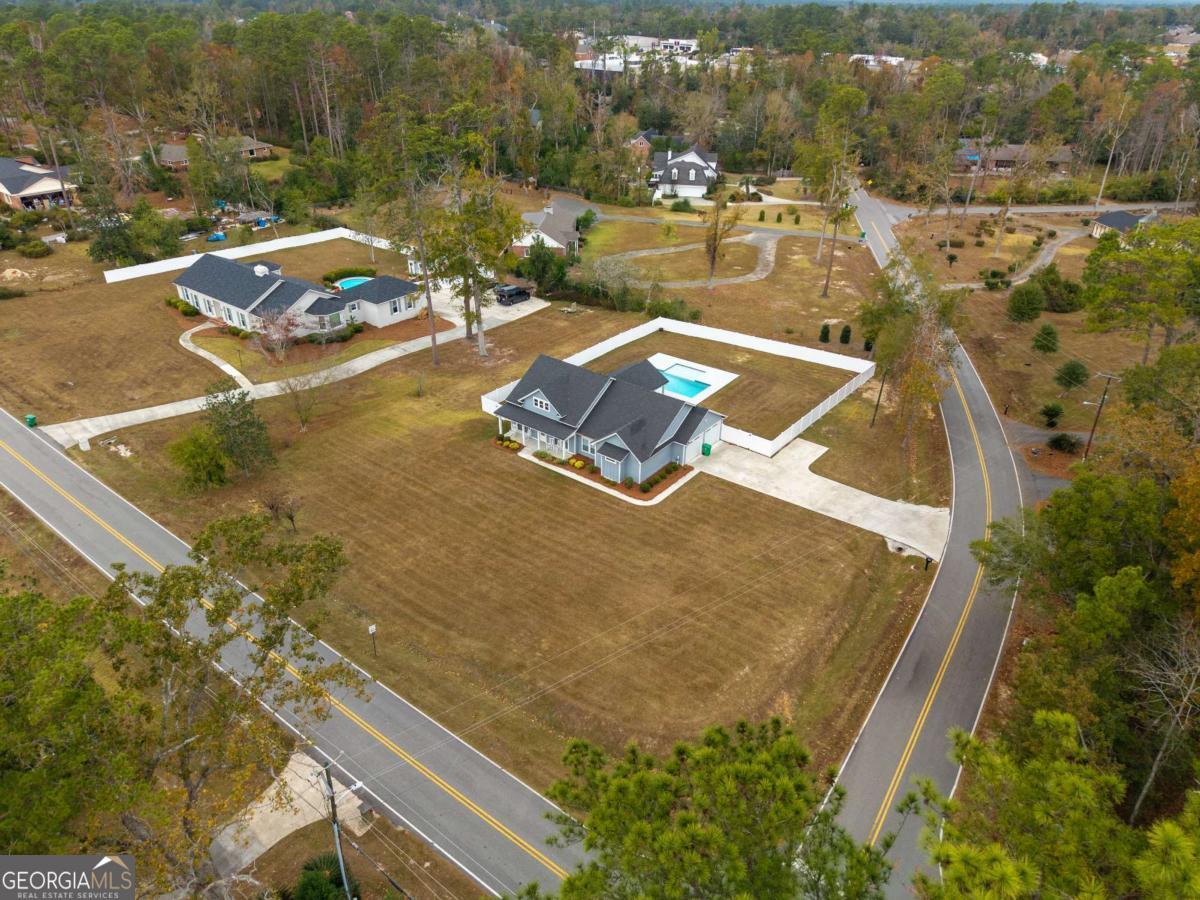 601 Pine Point Circle Valdosta, GA 31602 - Photo 5 of 45 a view of swimming pool with a lake view
