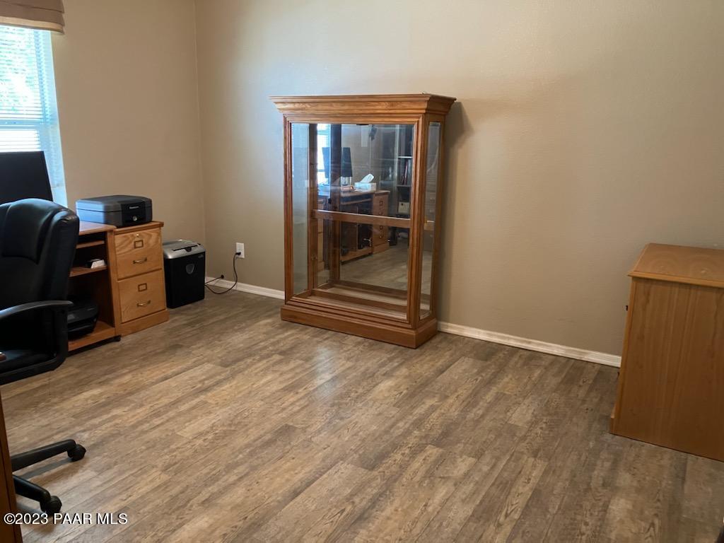 8855 East Turtle Rock Road Prescott Valley, AZ 86315 - Photo 25 of 62 a view of an empty room with a window