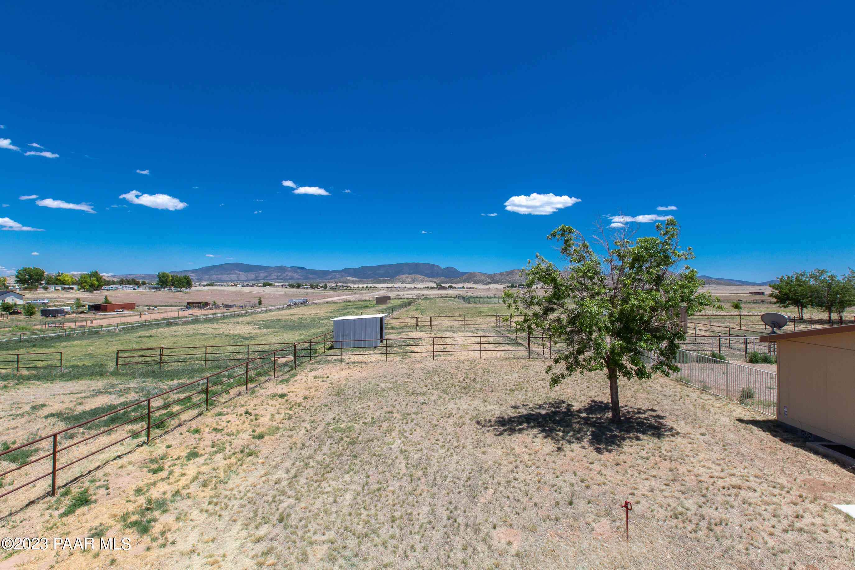 8855 East Turtle Rock Road Prescott Valley, AZ 86315 - Photo 43 of 62 a view of a lake with a beach