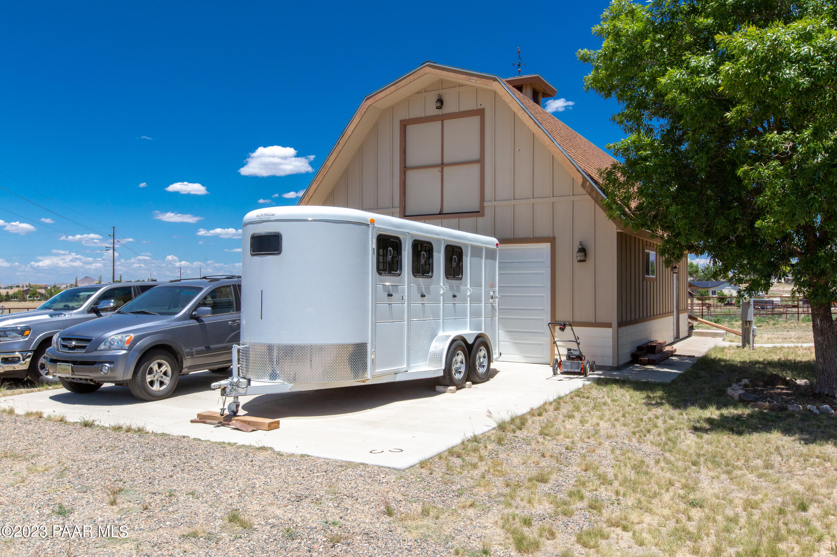 8855 East Turtle Rock Road Prescott Valley, AZ 86315 - Photo 5 of 62 a view of a car park in front of house