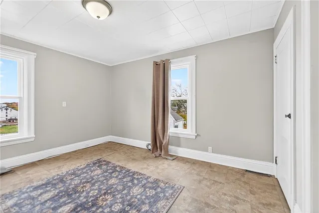 an empty room with windows