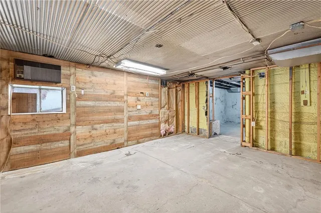 a bathroom with a toilet a sink and a shower