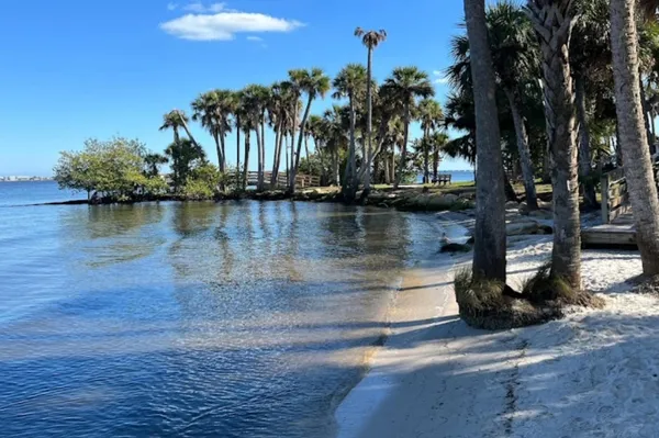 a view of a lake with a house
