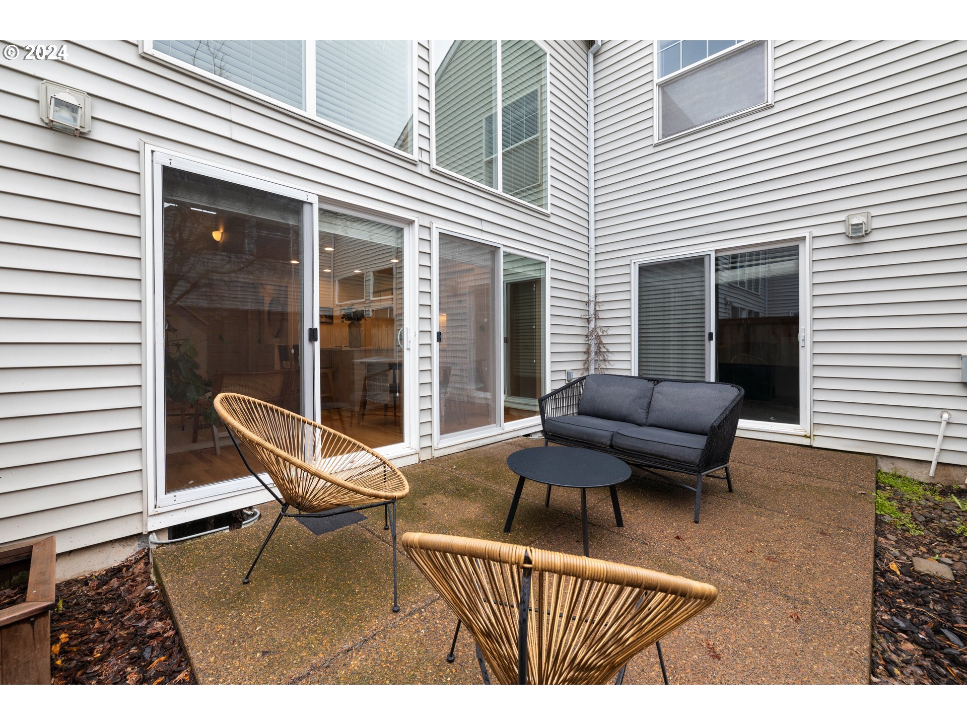14525 Southwest 6th Street Beaverton, OR 97007 - Photo 12 of 14 a building outdoor space with patio furniture