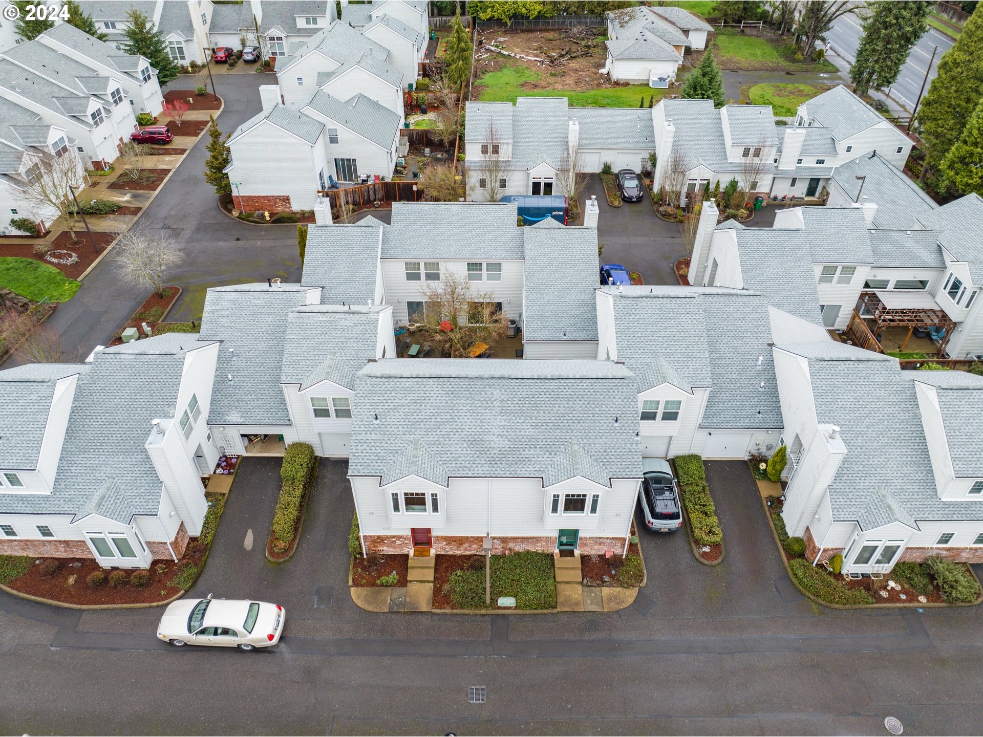 14525 Southwest 6th Street Beaverton, OR 97007 - Photo 14 of 14 an aerial view of residential houses with outdoor space