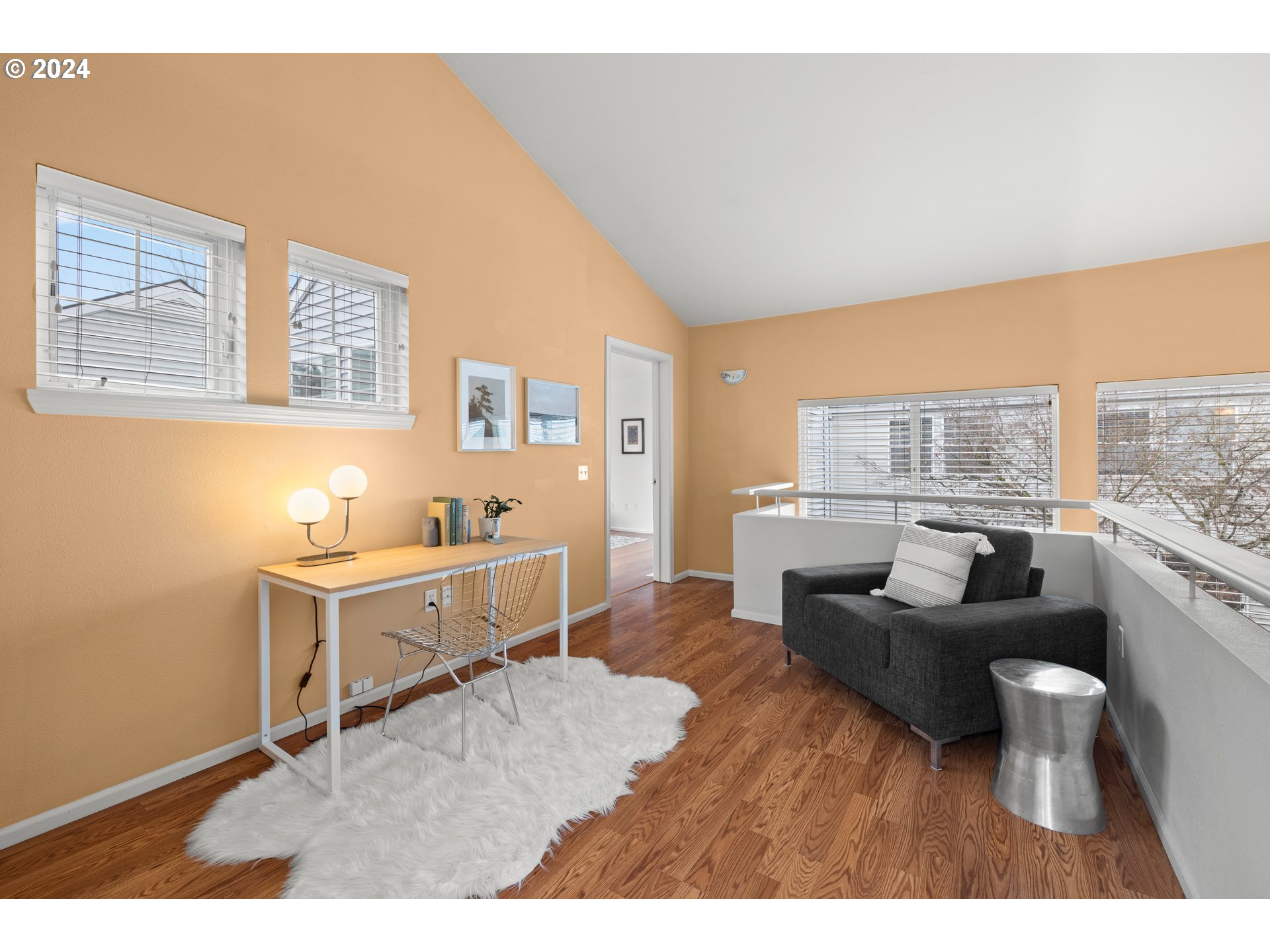 14525 Southwest 6th Street Beaverton, OR 97007 - Photo 7 of 14 a living room with furniture and a large window