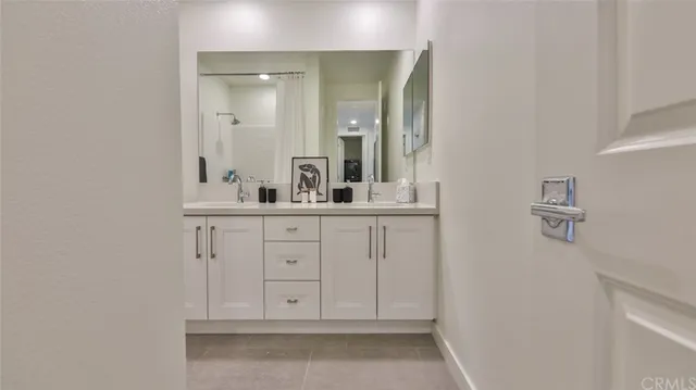 a couple of chairs sitting in a kitchen next to a chair