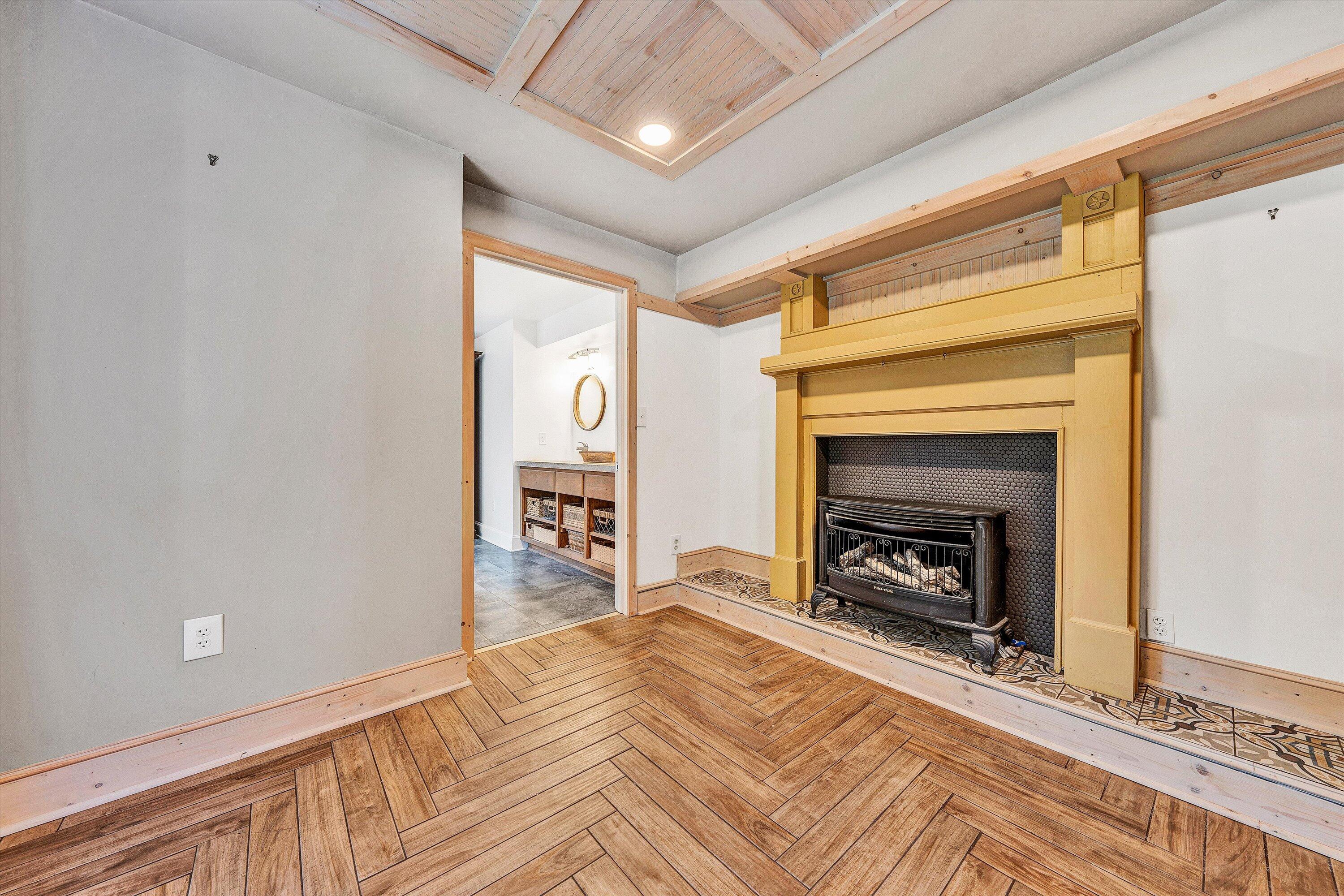 3561 Rutrough Road Southeast Roanoke, VA 24014 - Photo 19 of 63 a living room with furniture and a fireplace