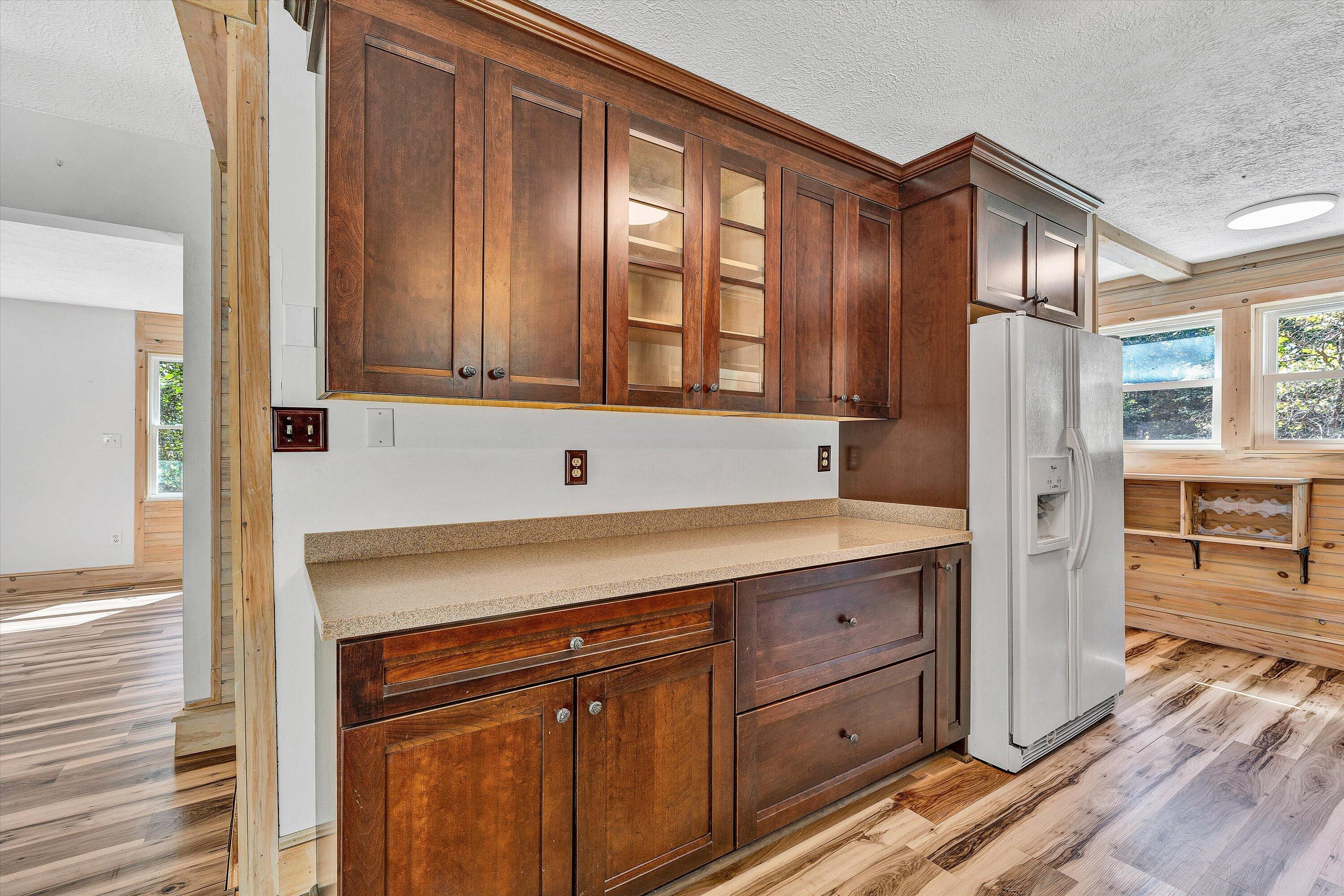 3561 Rutrough Road Southeast Roanoke, VA 24014 - Photo 29 of 63 a kitchen with a refrigerator and cabinets