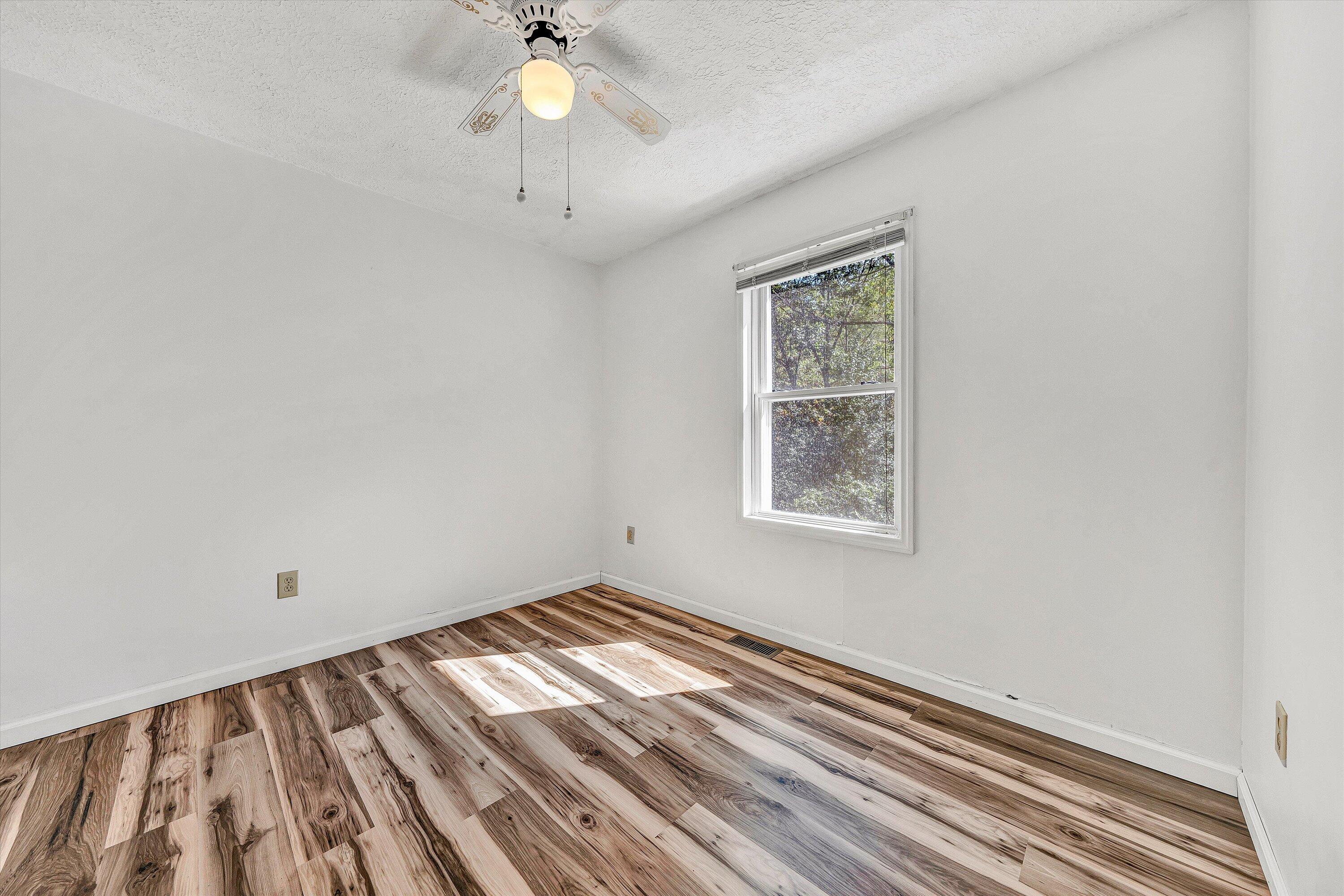 3561 Rutrough Road Southeast Roanoke, VA 24014 - Photo 38 of 63 a view of an empty room with a window