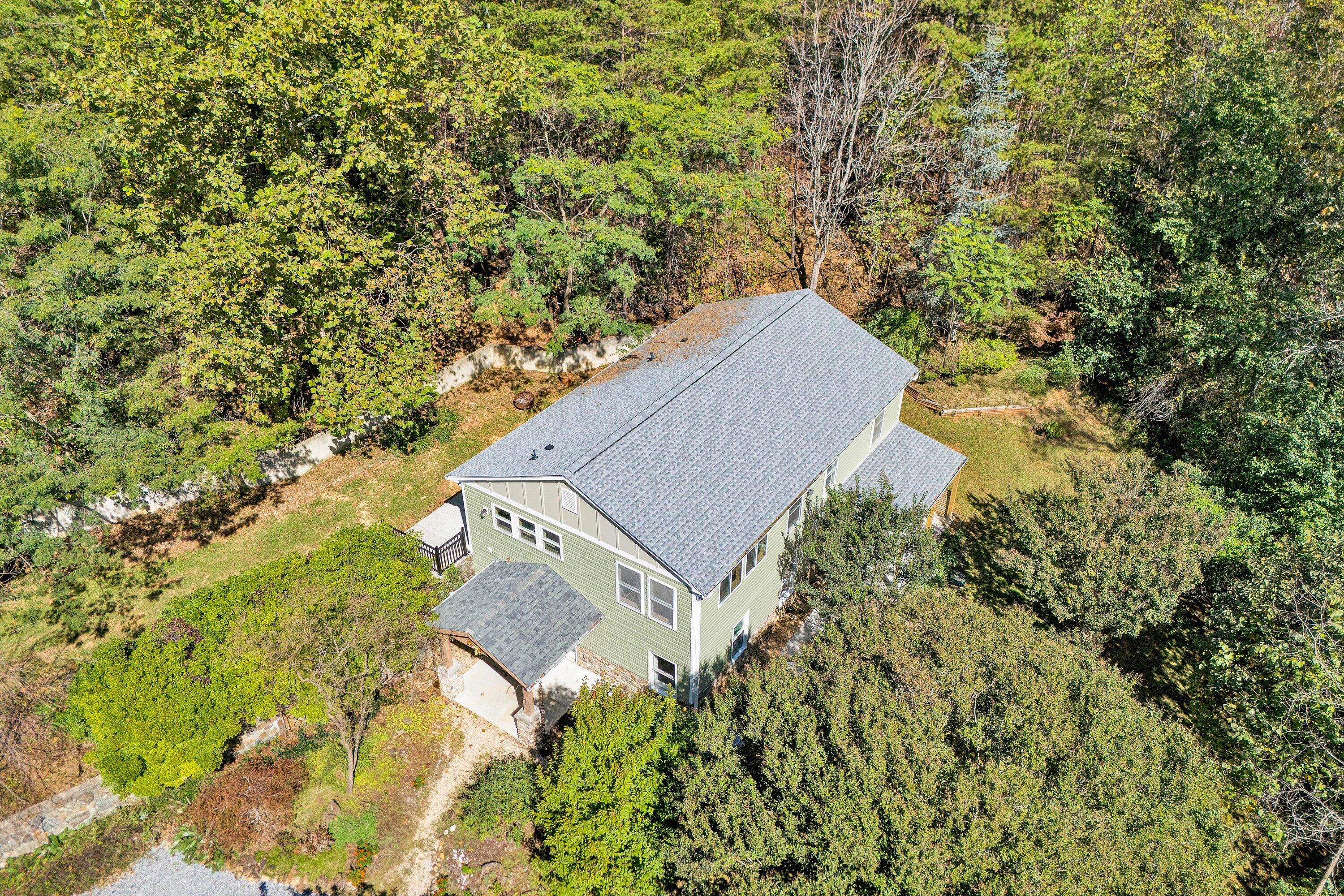 3561 Rutrough Road Southeast Roanoke, VA 24014 - Photo 5 of 63 view of a house with a yard and trees