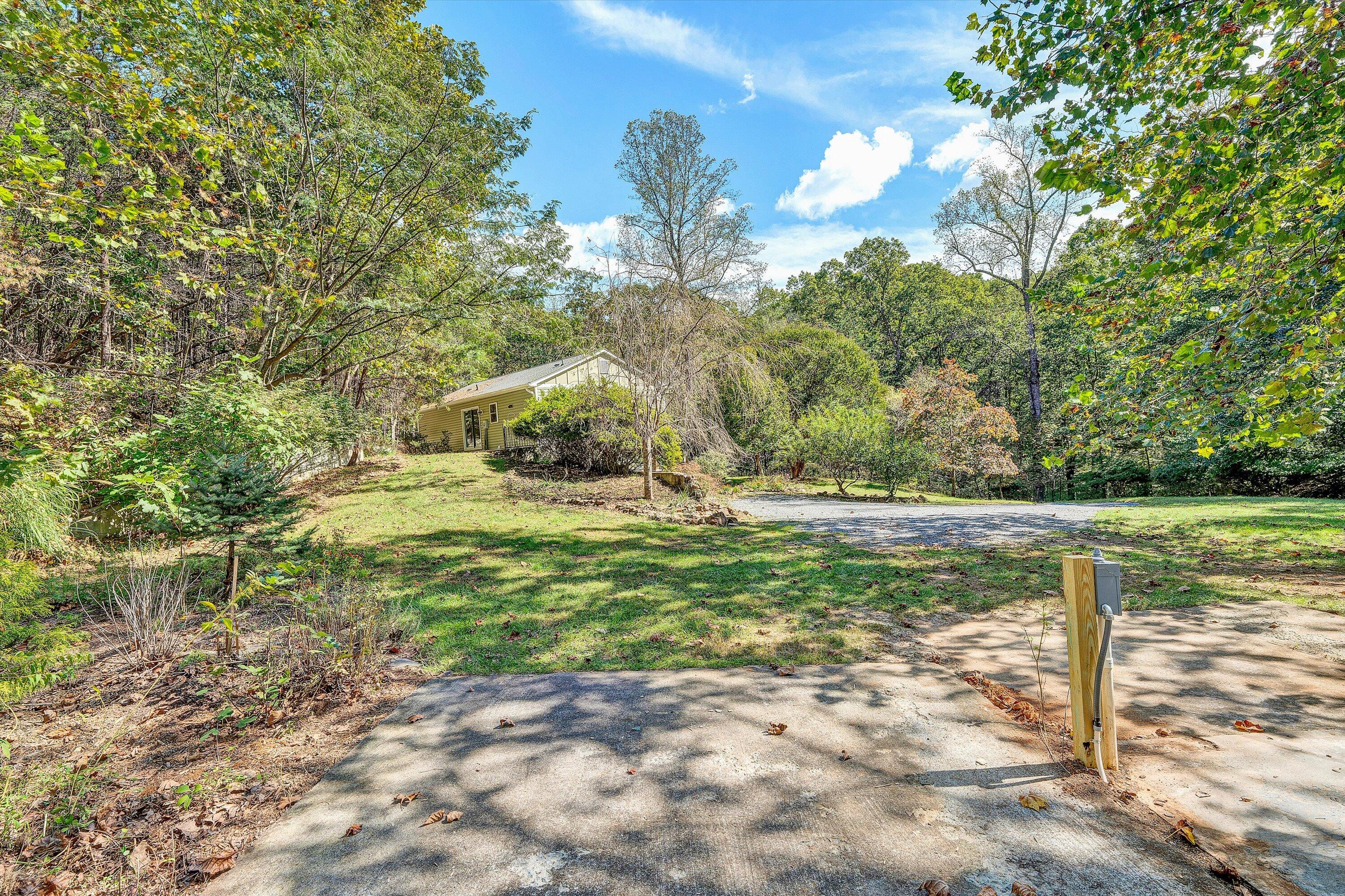 3561 Rutrough Road Southeast Roanoke, VA 24014 - Photo 52 of 63 a view of a yard with large trees