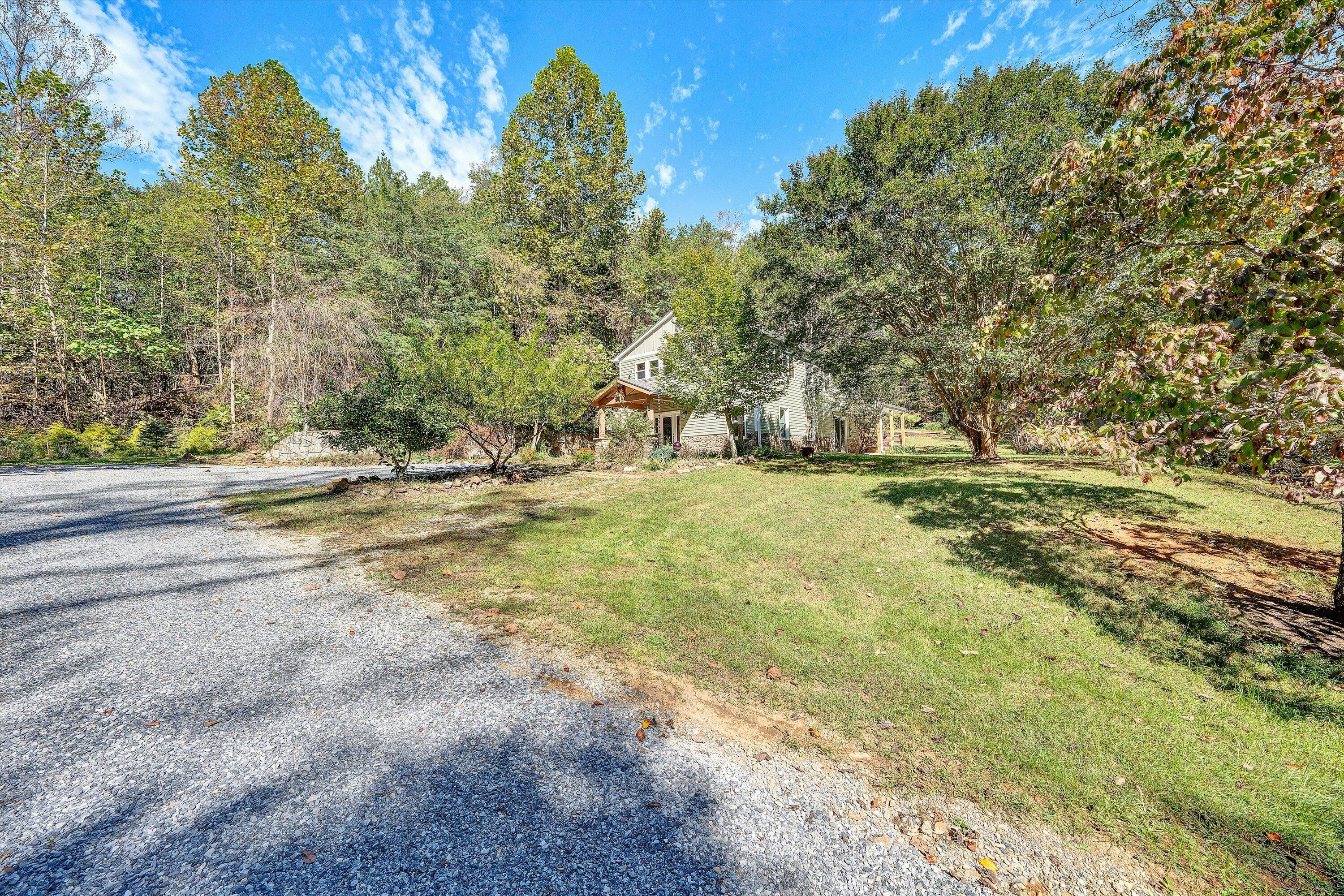 3561 Rutrough Road Southeast Roanoke, VA 24014 - Photo 53 of 63 a view of outdoor space with trees all around