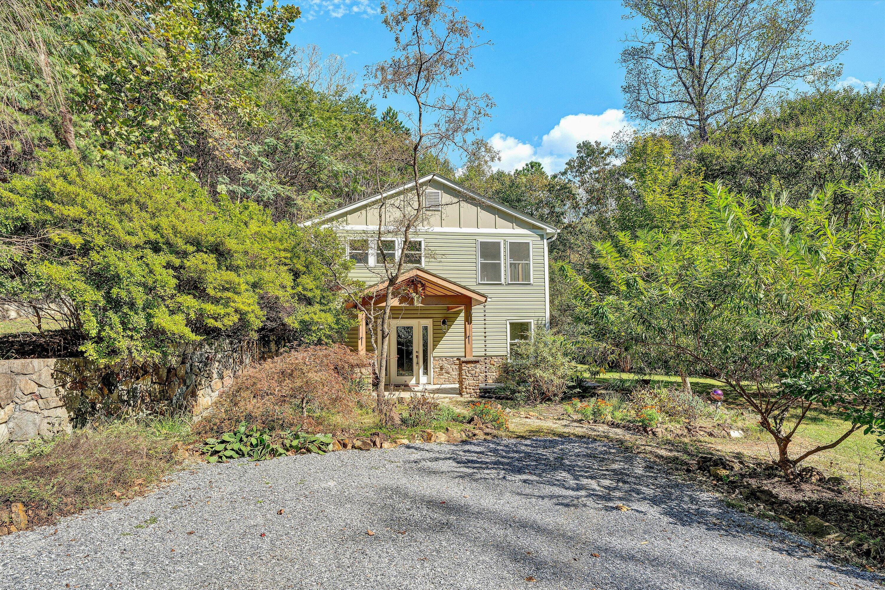 3561 Rutrough Road Southeast Roanoke, VA 24014 - Photo 6 of 63 a front view of a house with a yard and garage