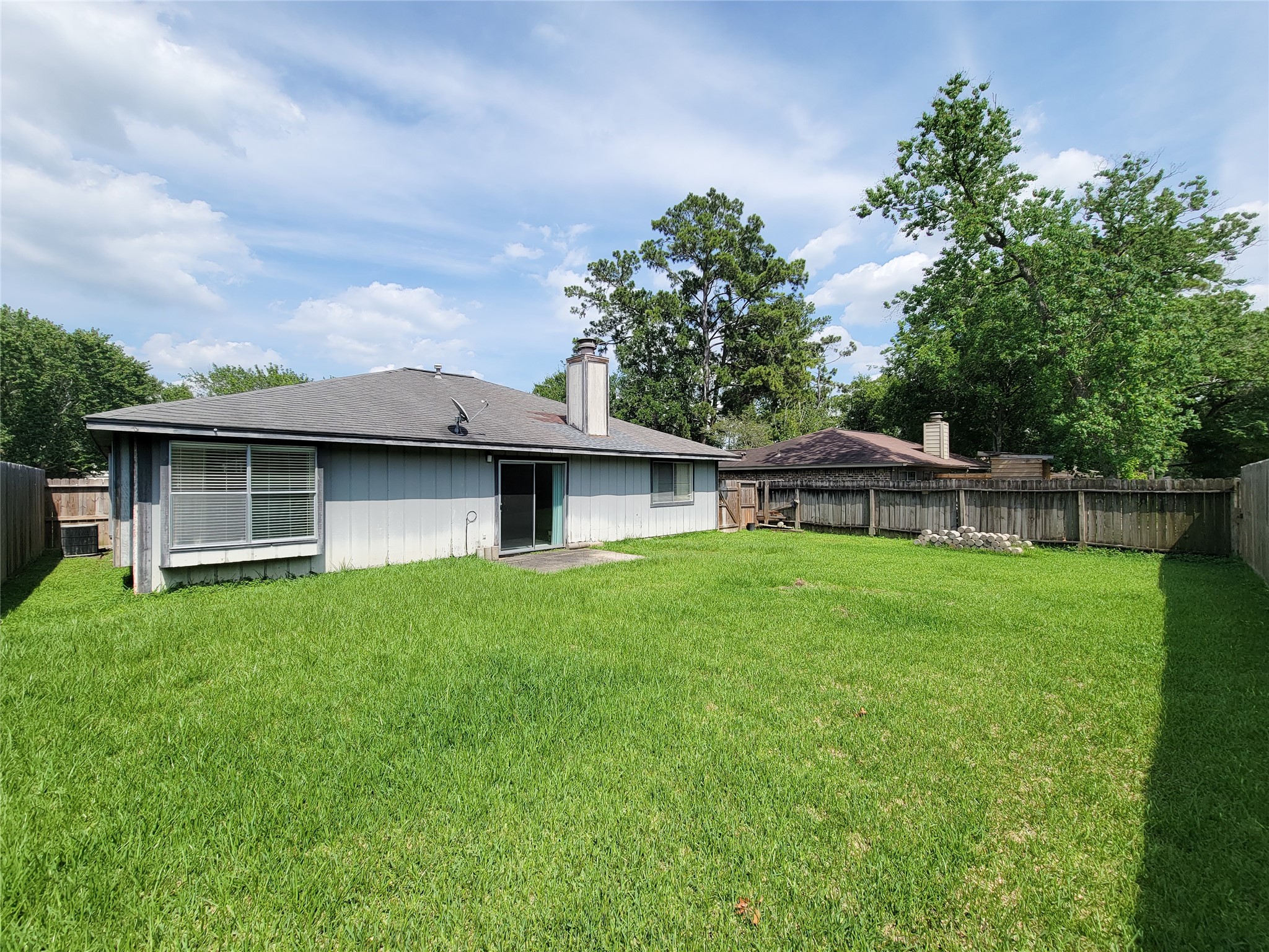 23211 Timberbrook Drive Spring, TX 77373 - Photo 33 of 34 a front view of a house with a garden