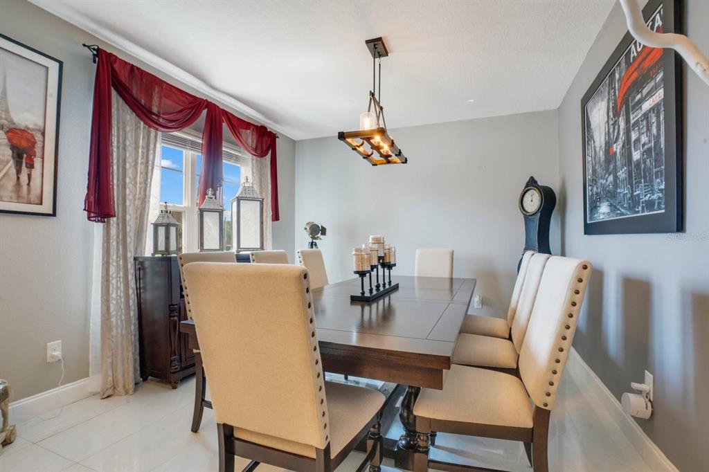 4583 Northeast 27th Street Ocala, FL 34470 - Photo 7 of 43 a dining room with furniture and window