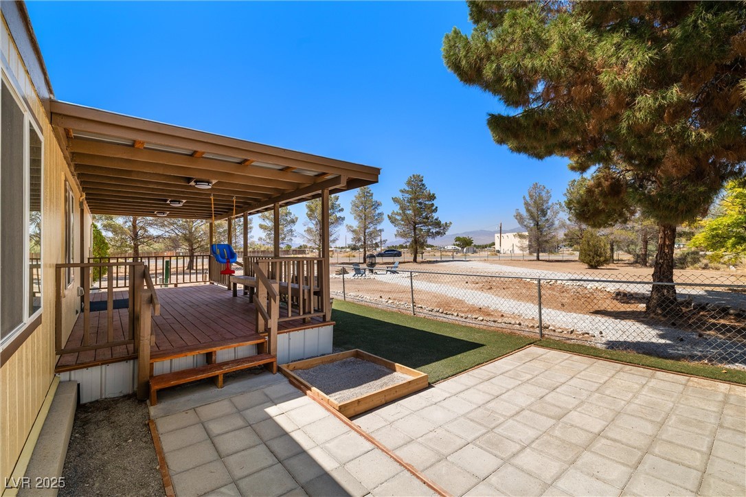 1771 East Brian Road Pahrump, NV 89048 - Photo 22 of 29 View of patio featuring a wooden deck