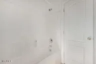 a close up of a white marble wall