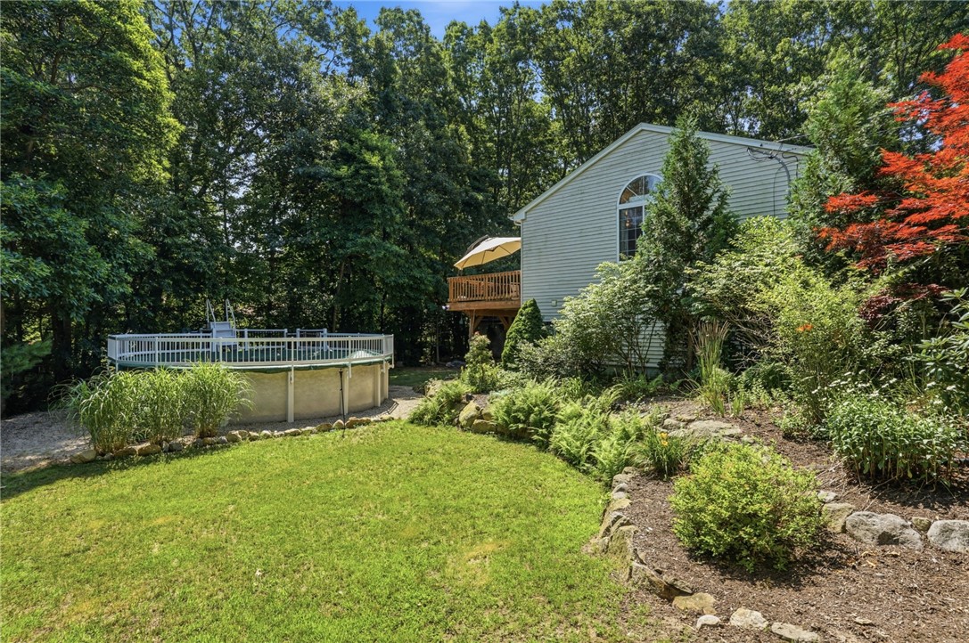 3 Cote Court Coventry, RI 02816 - Photo 3 of 34 Side yard