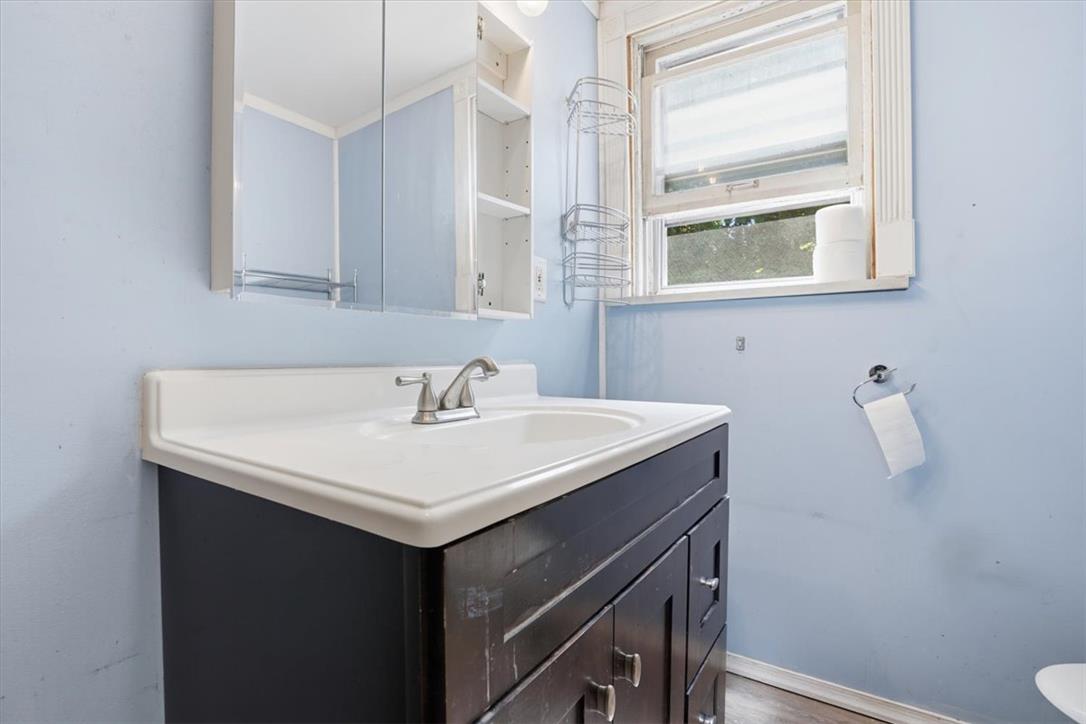 167 Main Road Lehighton, PA 18235 - Photo 25 of 41 A well-appointed bathroom features a single vanity with ample storage beneath and a bright window.