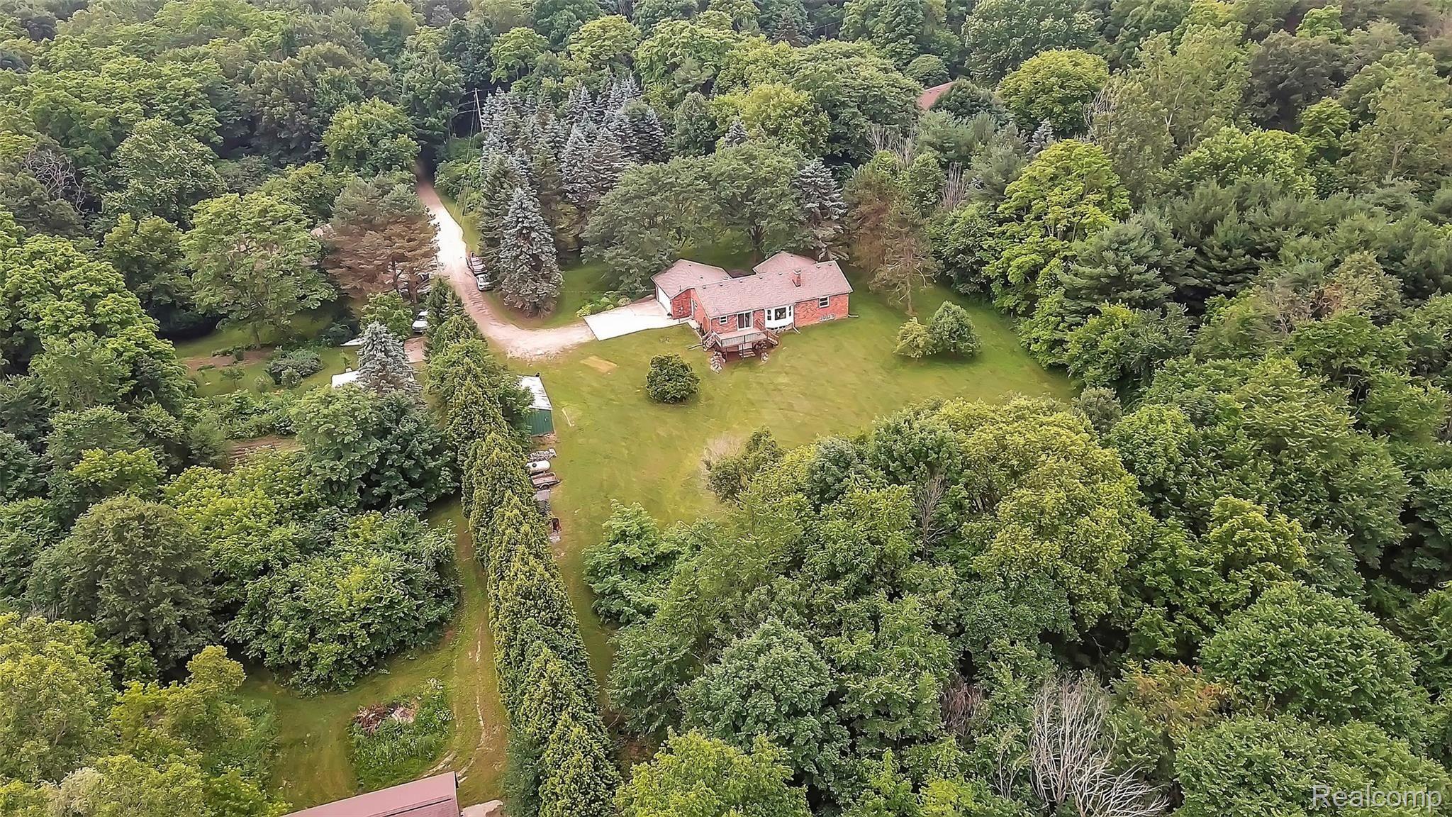 3485 West Rattalee Lake Road Holly, MI 48442 - Photo 44 of 46 3485-W-Rattalee-Lake-Rd-Holly-MI-48442-windowstill-50.jpg