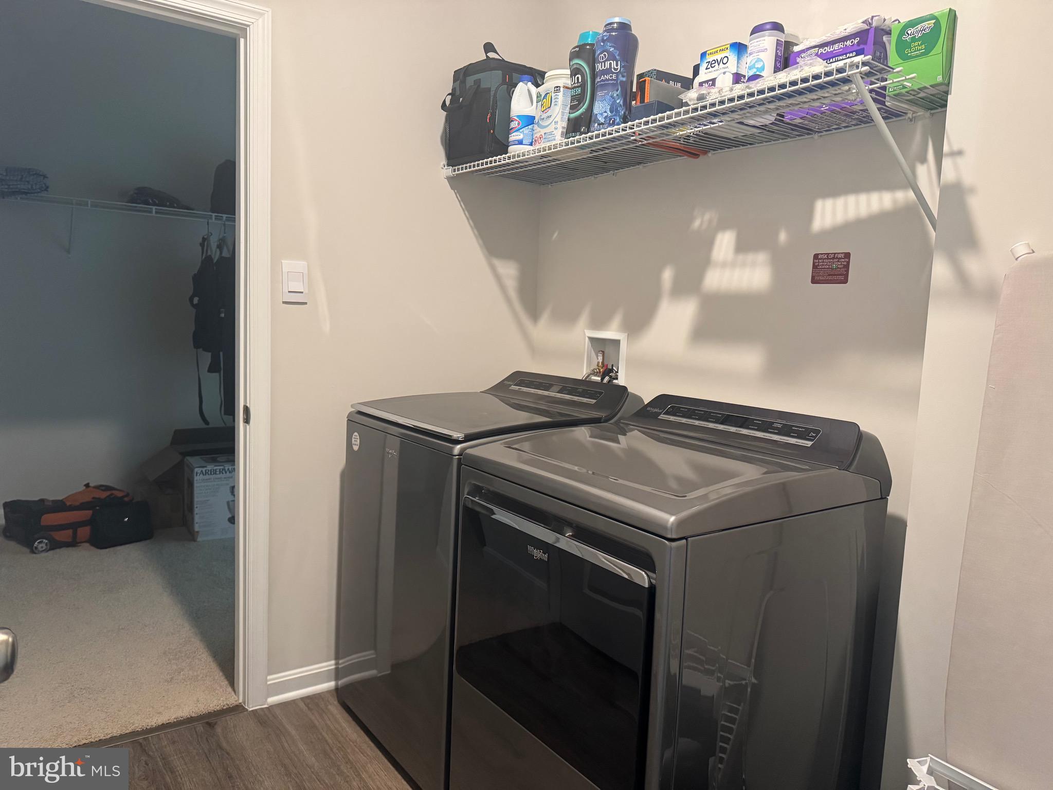 241 Atkinson Street Charles Town, WV 25414 - Photo 26 of 37 a utility room with dryer and washer