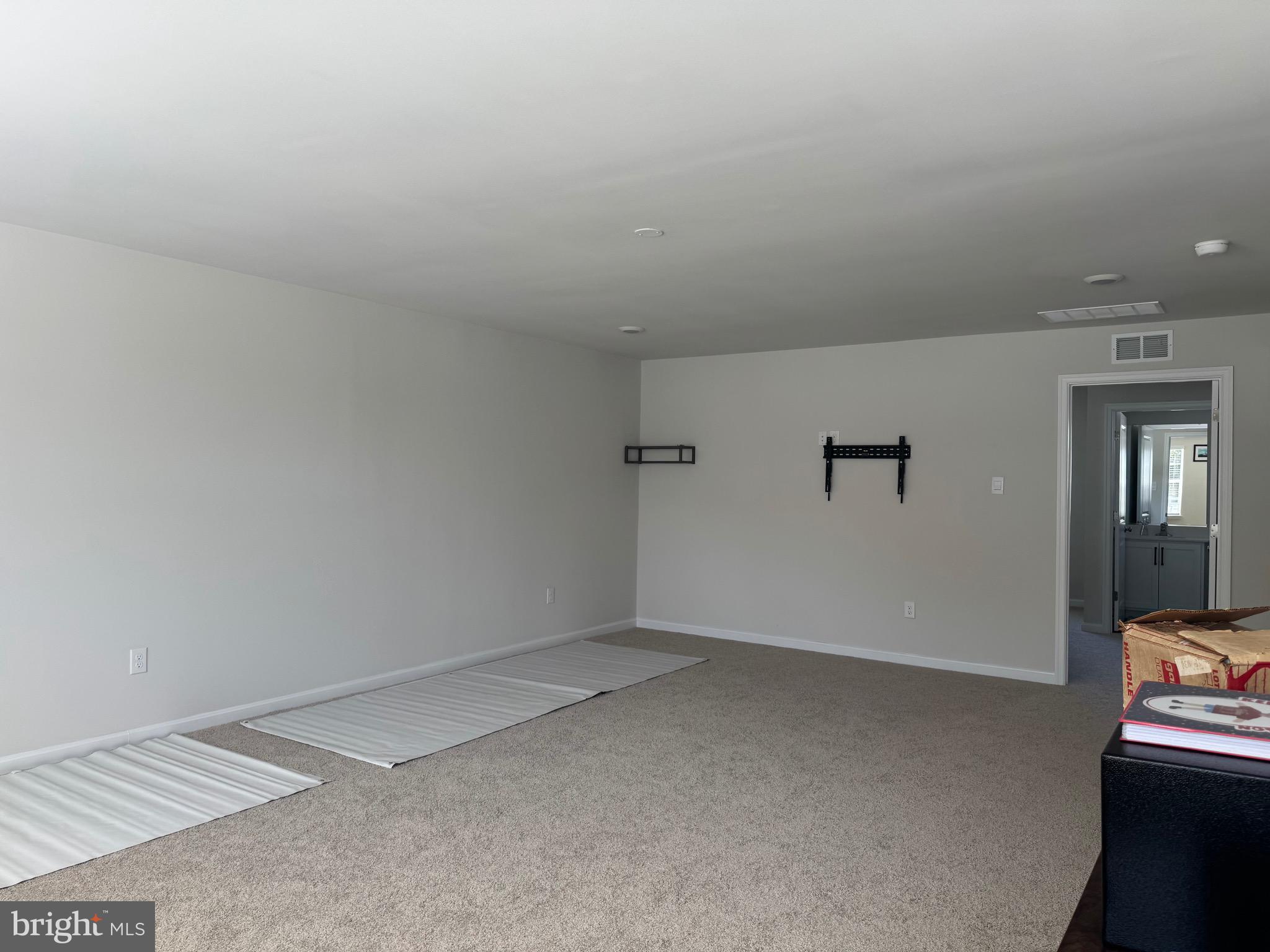 241 Atkinson Street Charles Town, WV 25414 - Photo 28 of 37 an empty room with a workbench