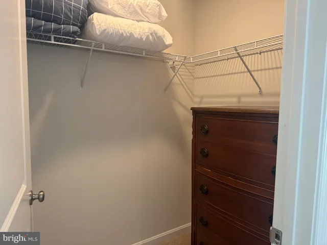 a view of an entryway with hallway