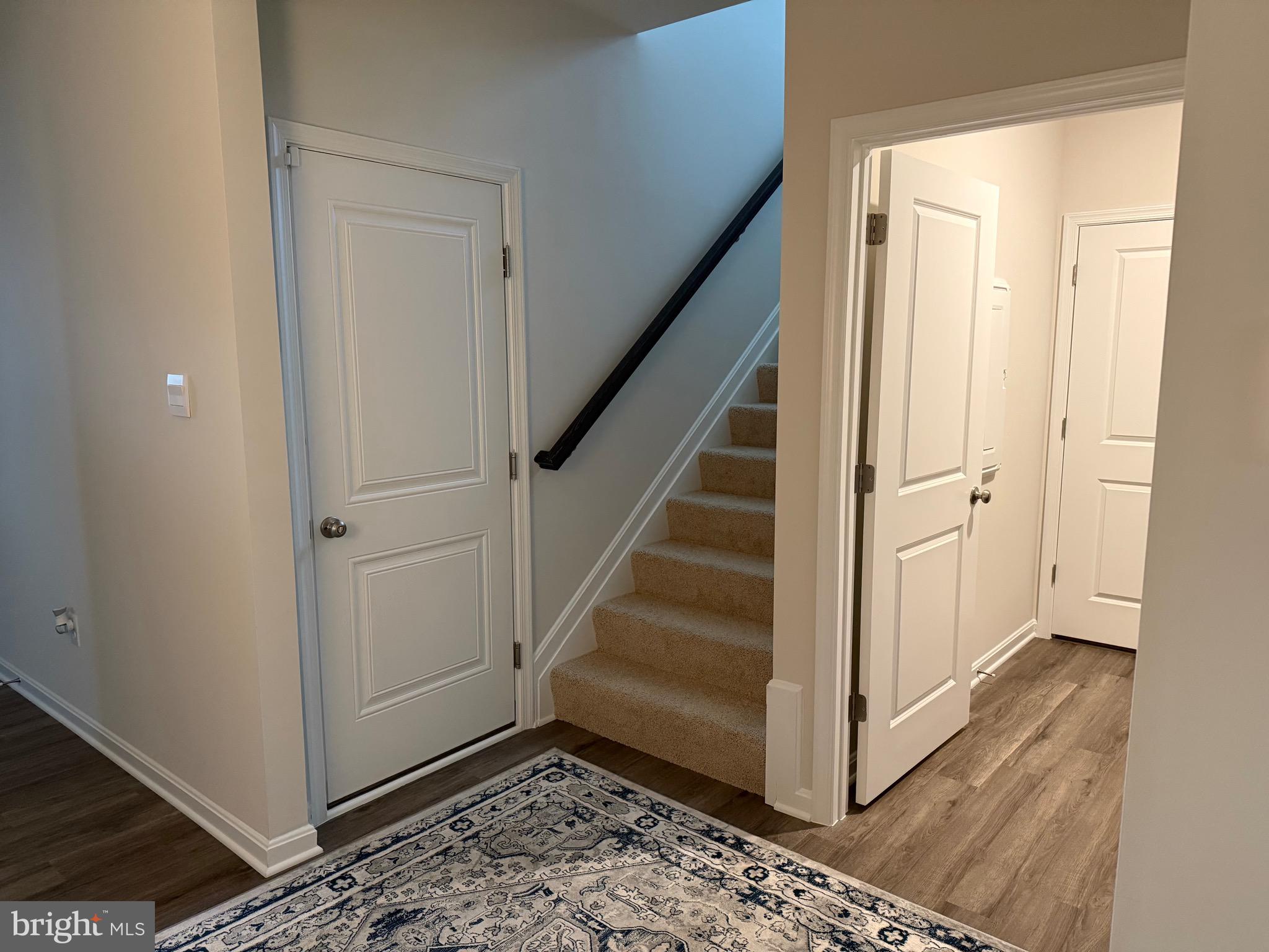 241 Atkinson Street Charles Town, WV 25414 - Photo 35 of 37 a view of a hallway with staircase