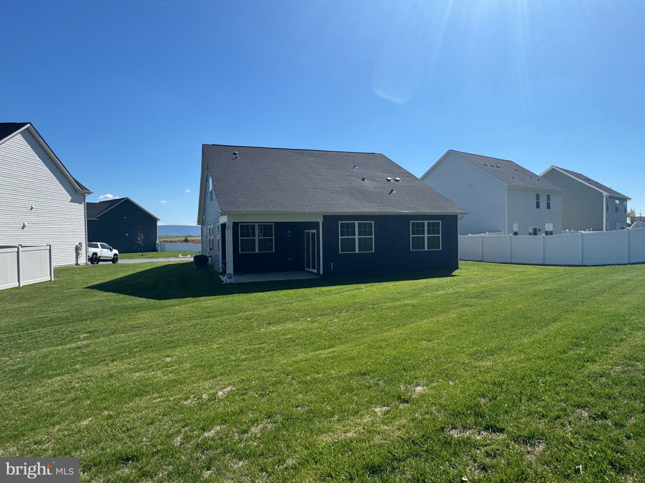 241 Atkinson Street Charles Town, WV 25414 - Photo 5 of 37 a house view with a garden space