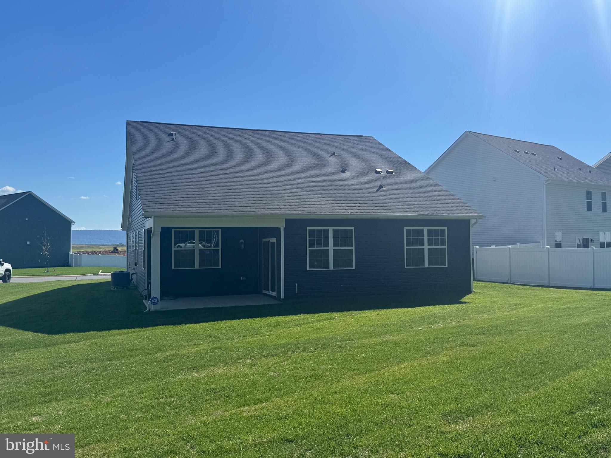 241 Atkinson Street Charles Town, WV 25414 - Photo 6 of 37 a front view of house with yard and green space