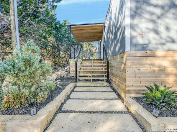 a view of a pathway with a bench