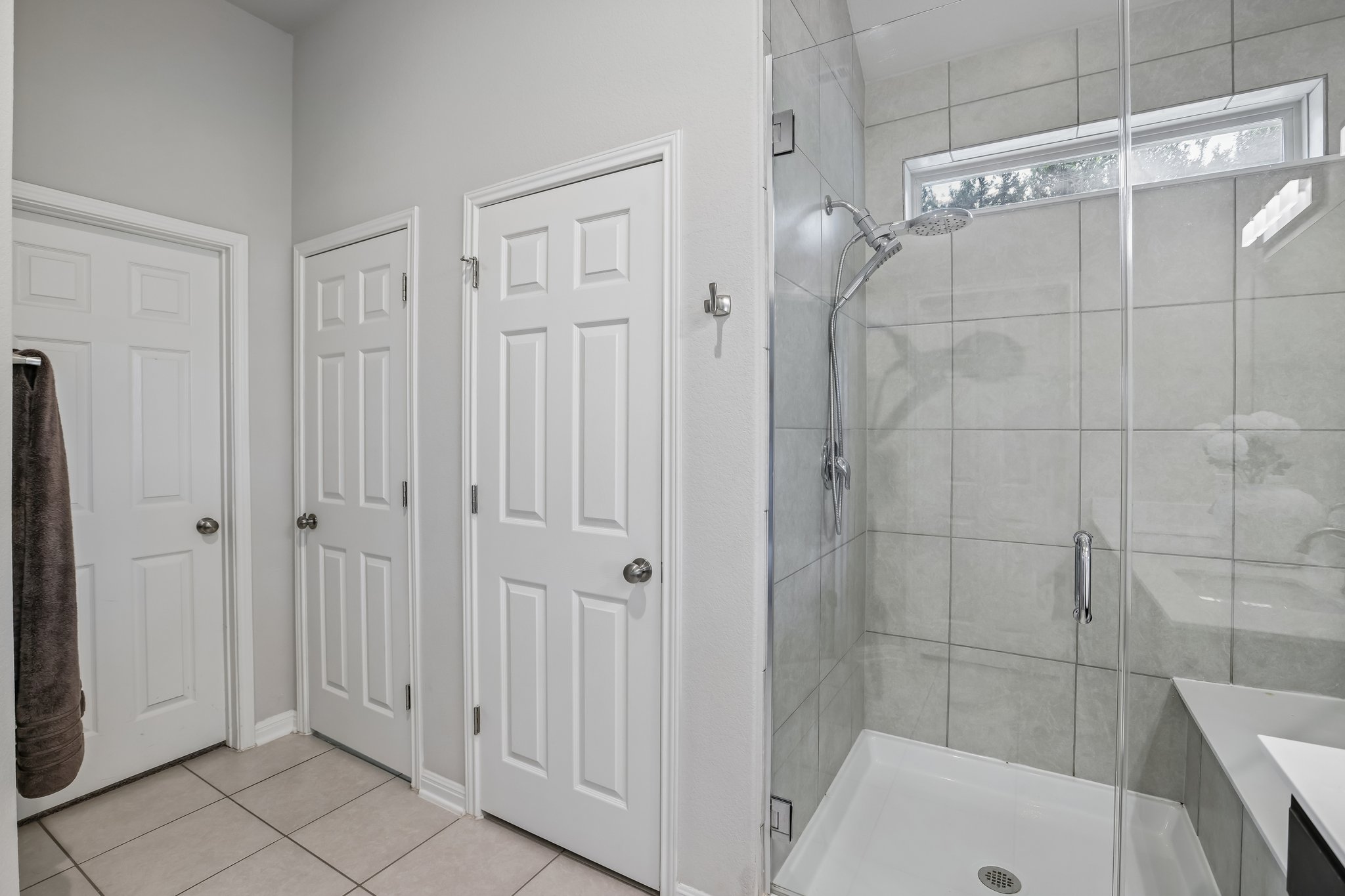 6801 Banff Cove Austin, TX 78754 - Photo 20 of 37 Primary shower space offers a serene and functional retreat