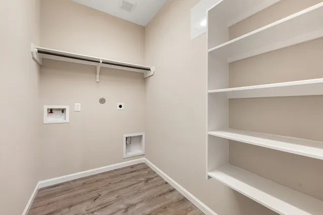 a view of an empty walk in closet