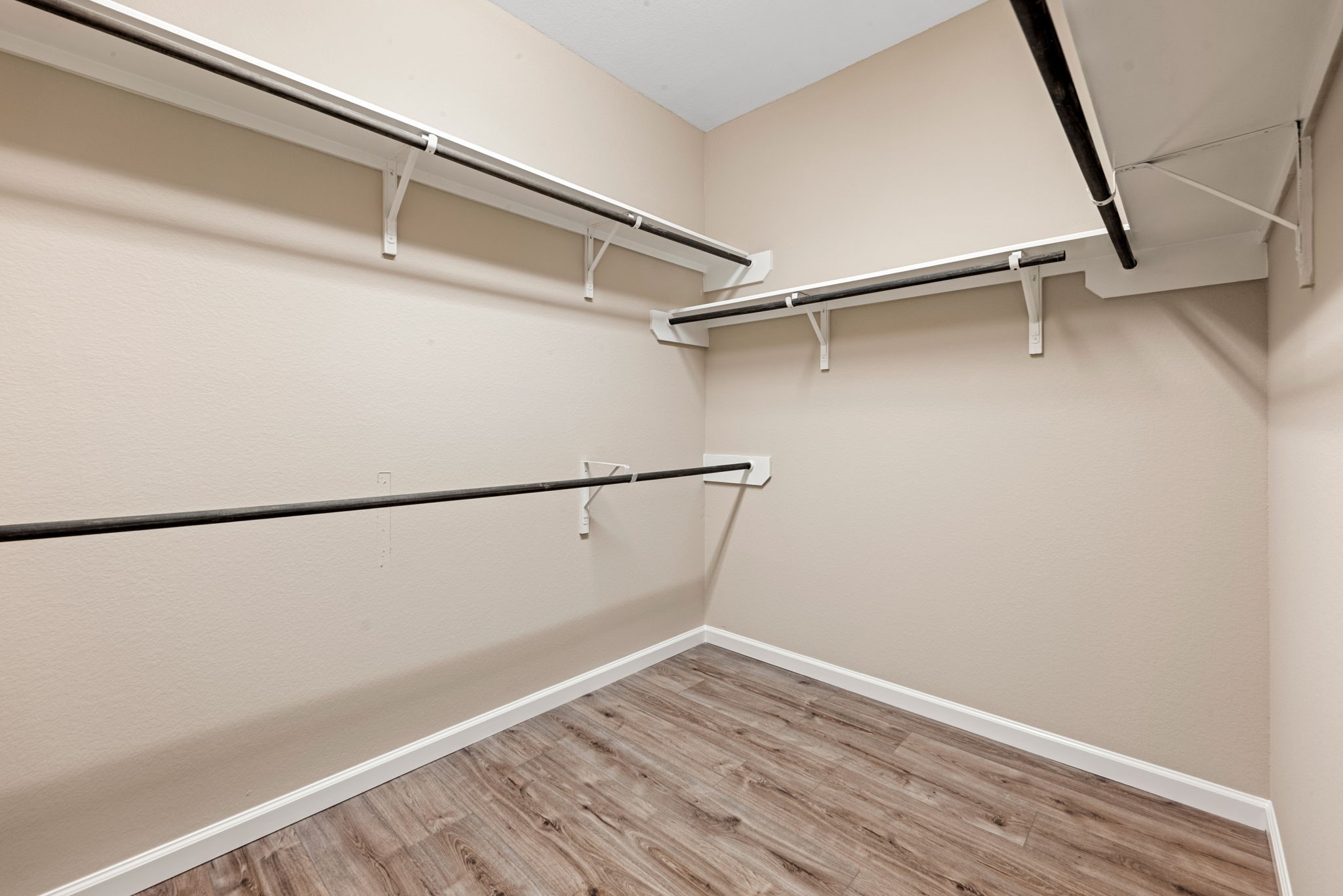 11429 West Woodmark Conroe, TX 77304 - Photo 18 of 29 a view of small space with racks on the wall and a window