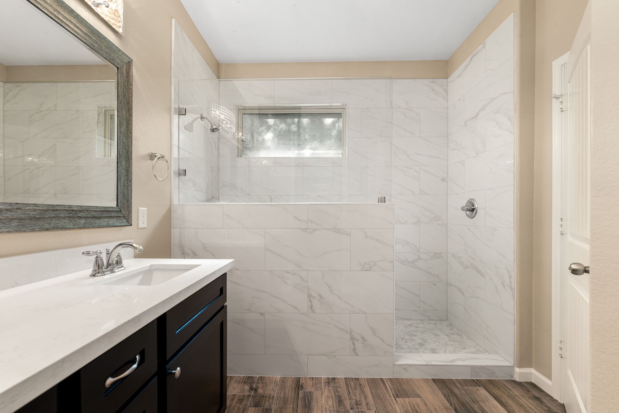 11429 West Woodmark Conroe, TX 77304 - Photo 20 of 29 a bathroom with a sink and a mirror