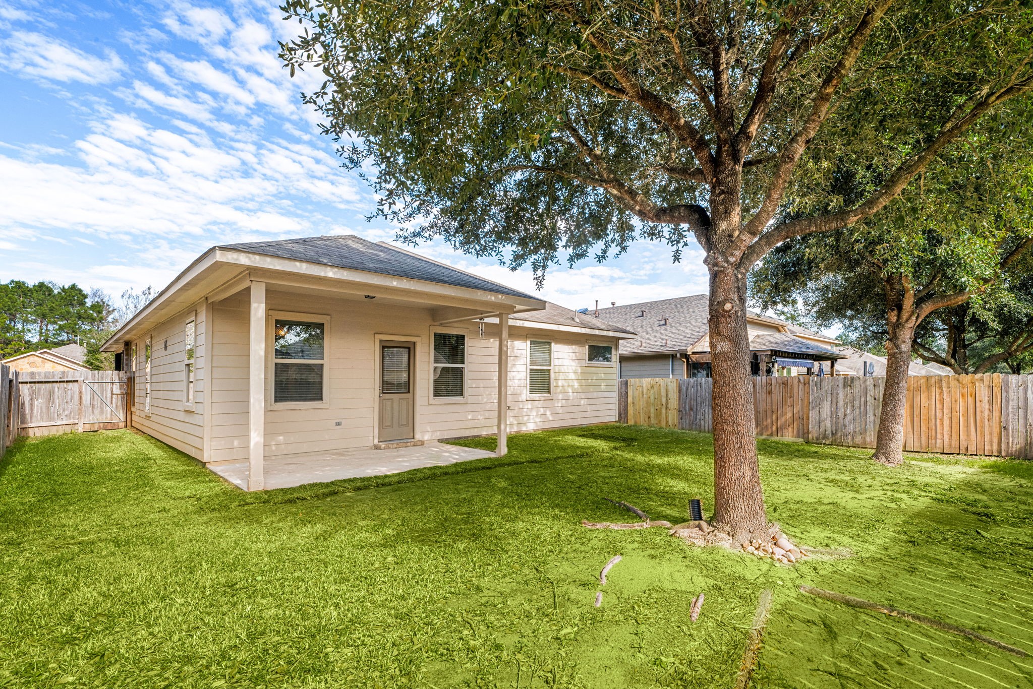 11429 West Woodmark Conroe, TX 77304 - Photo 28 of 29 a front view of house with yard and green space