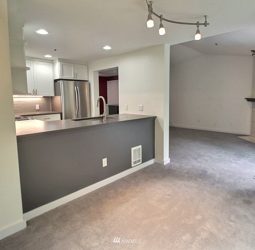 19404 Bothell Way Northeast, Unit B304 Bothell, WA 98011 - Photo 11 of 38 a view of kitchen with refrigerator and window