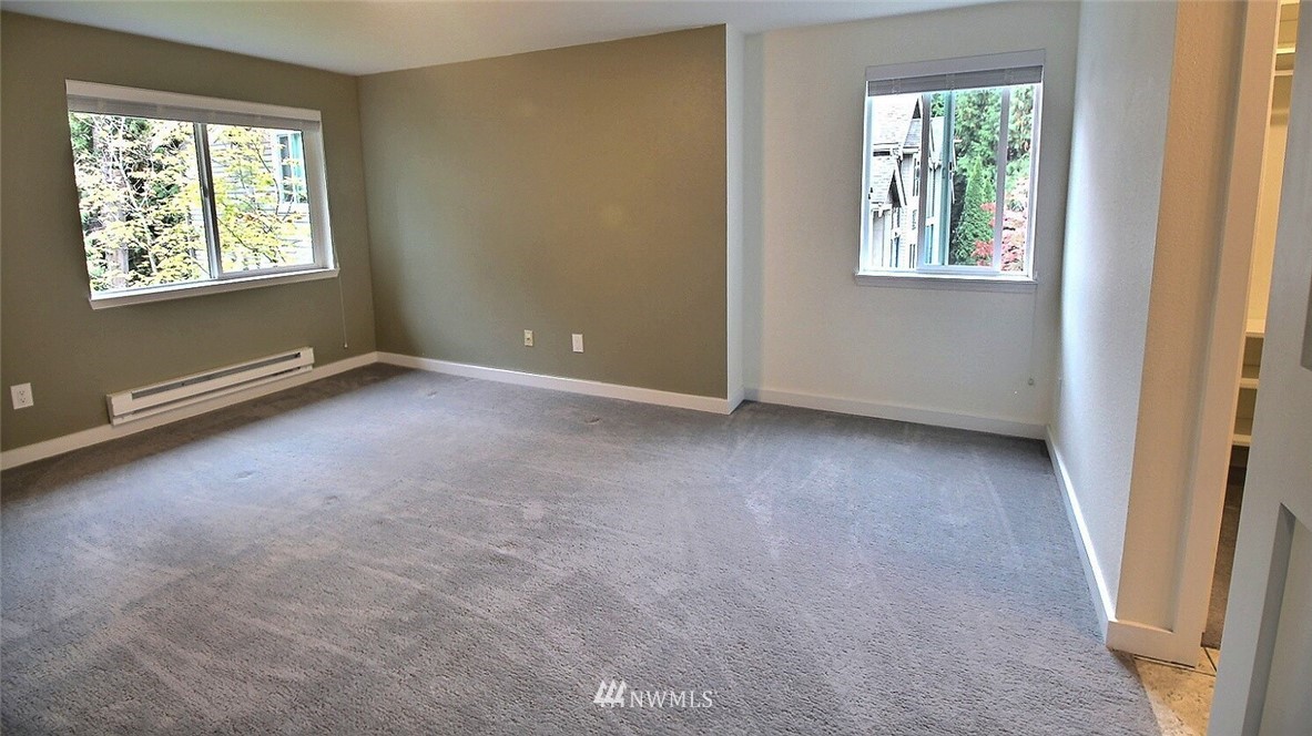19404 Bothell Way Northeast, Unit B304 Bothell, WA 98011 - Photo 15 of 38 an empty room with windows