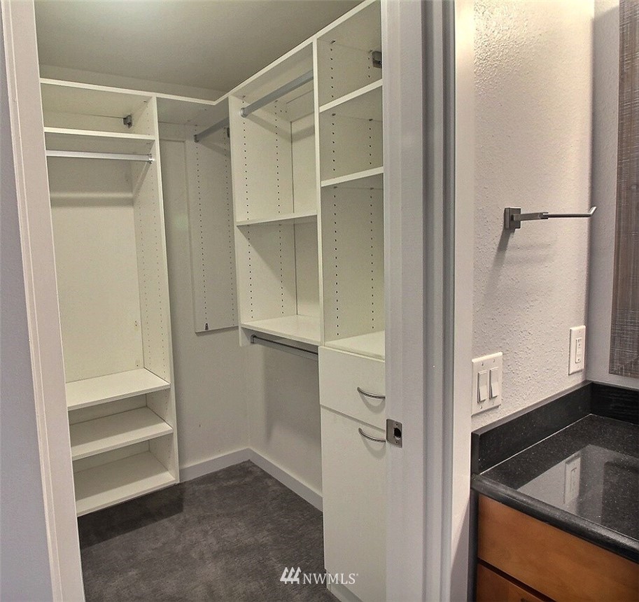 19404 Bothell Way Northeast, Unit B304 Bothell, WA 98011 - Photo 19 of 38 a view of walk in closet with empty racks