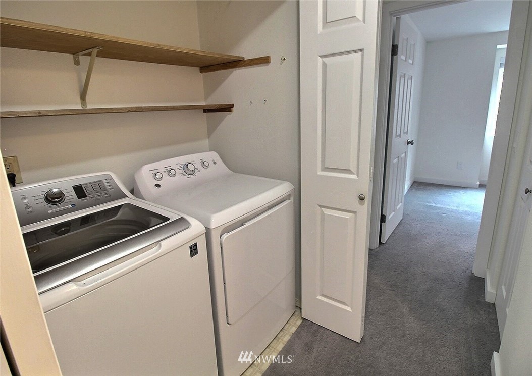 19404 Bothell Way Northeast, Unit B304 Bothell, WA 98011 - Photo 21 of 38 a utility room with dryer and washer