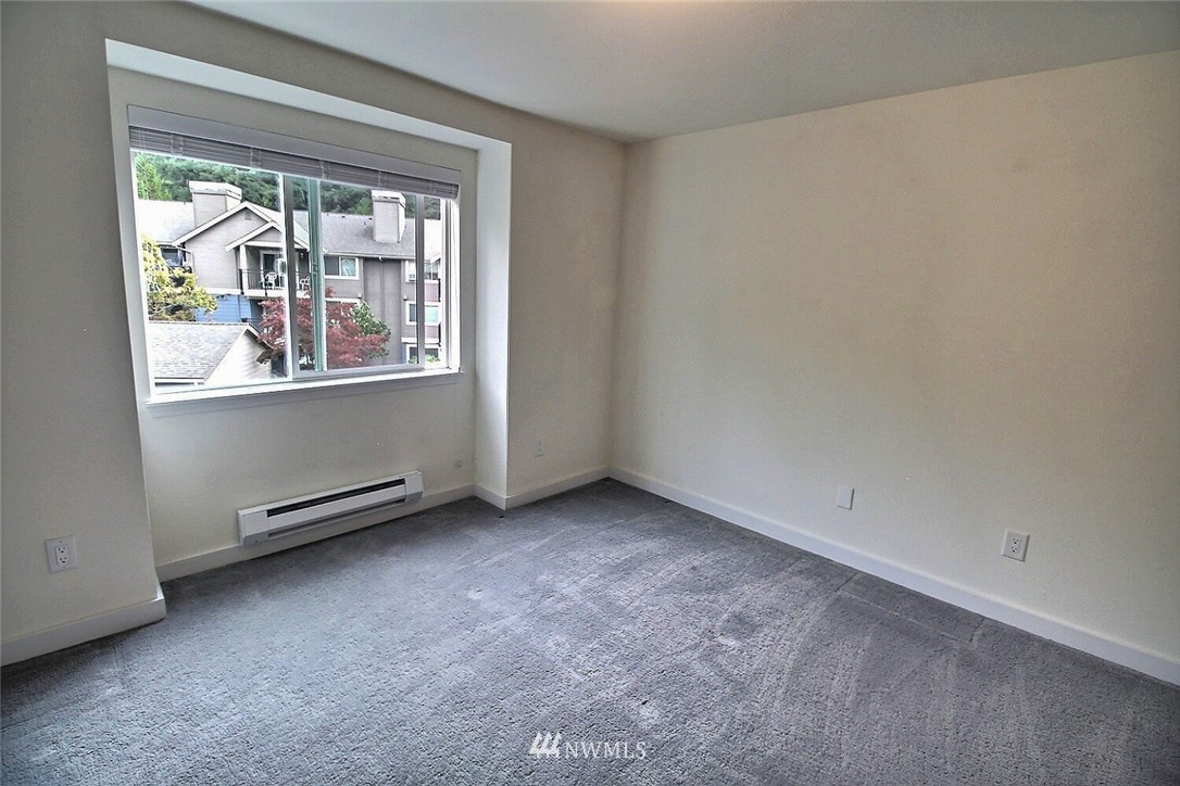 19404 Bothell Way Northeast, Unit B304 Bothell, WA 98011 - Photo 22 of 38 an empty room with a window