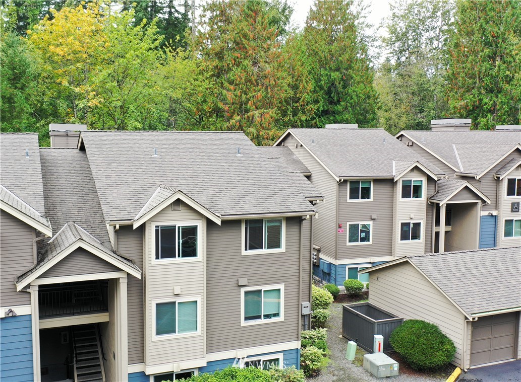 19404 Bothell Way Northeast, Unit B304 Bothell, WA 98011 - Photo 32 of 38 a aerial view of a white house with a large windows